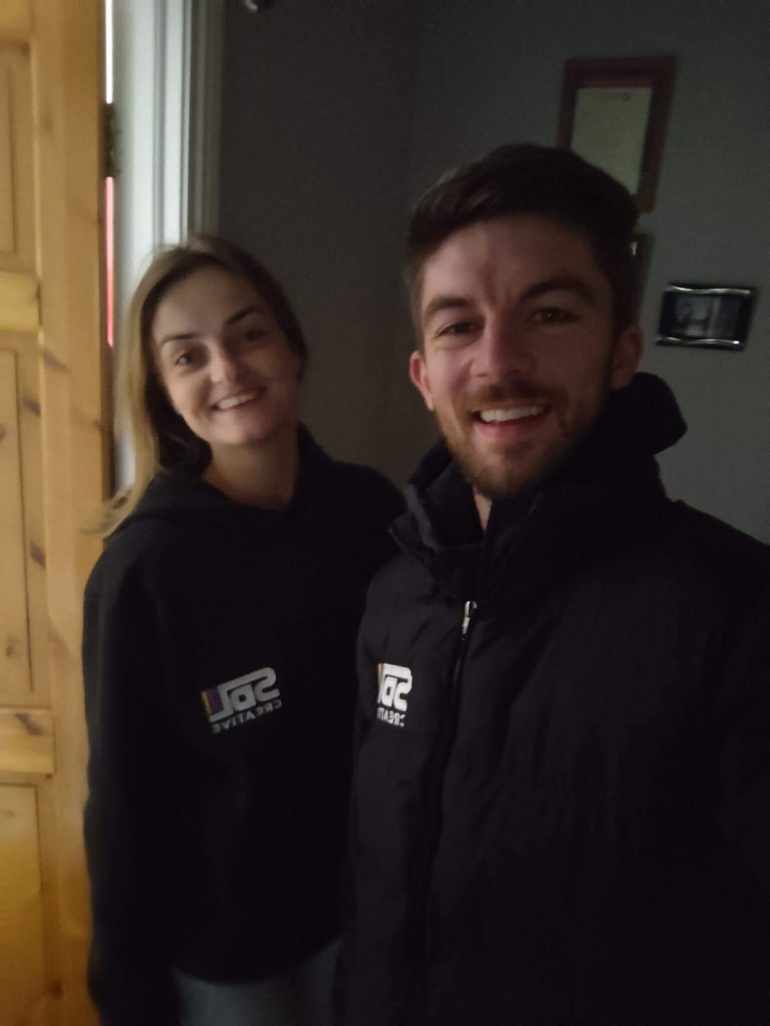 Sean and Lauren repping SDL merchandise
