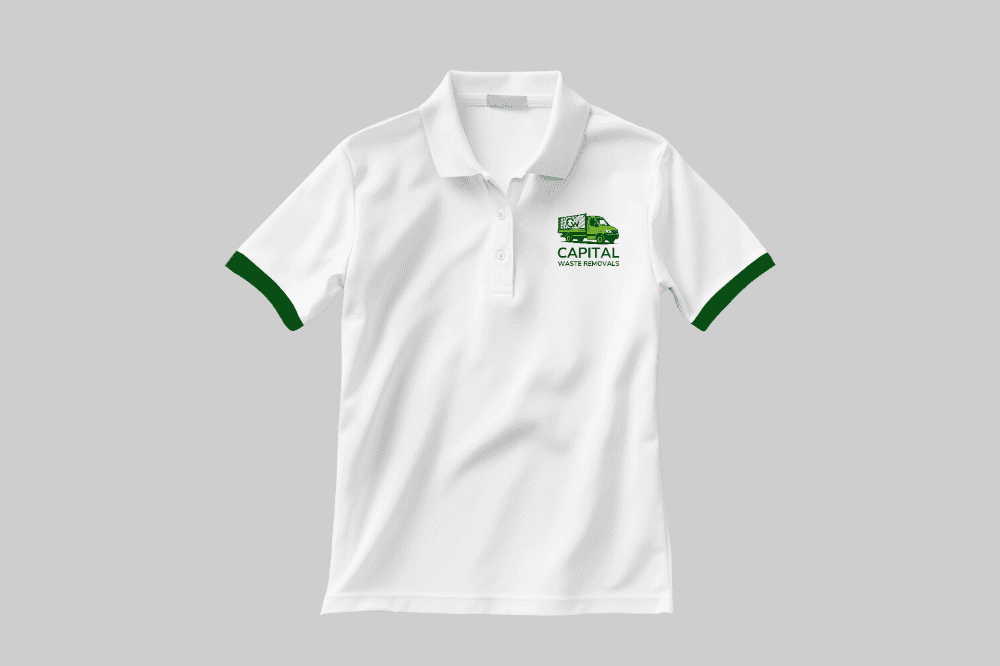 White polo shirt with green Capital Waste Removal logo for branding.